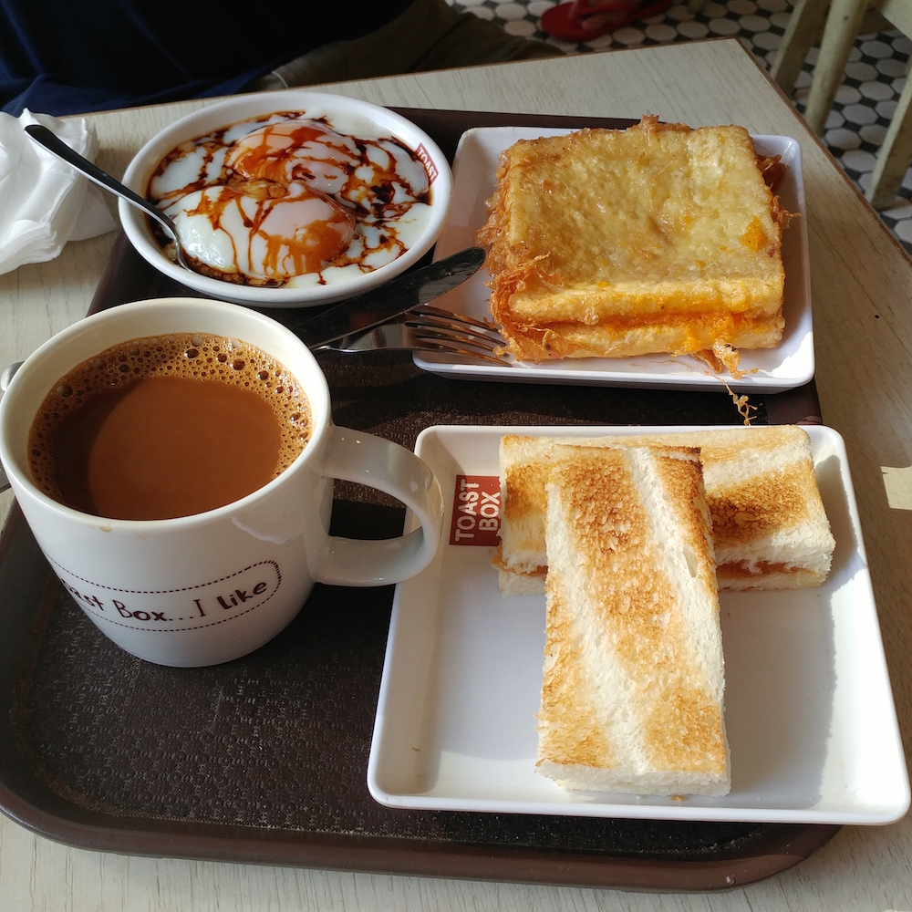 Kaya toast and soft boiled eggs - a popular breakfast or snack in Singapore 