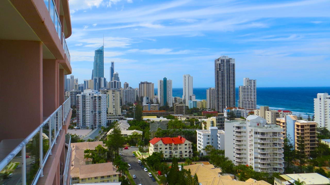 View of the Gold Coast's cityscape and ocean horizon from the balcony of a building