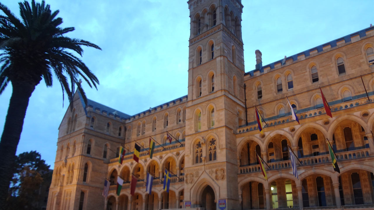 ICMS's ornate architecture showcased in the main entrance building at dusk