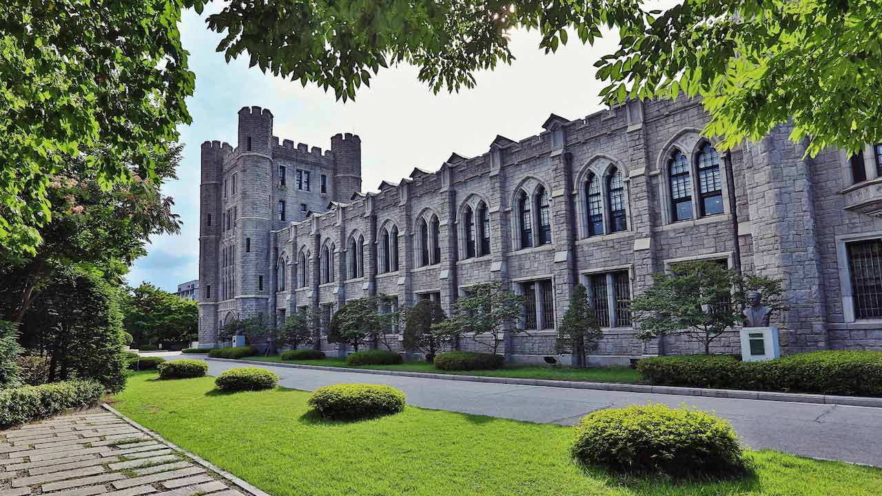 An ornate building on Korea University's campus surrounded by greenery