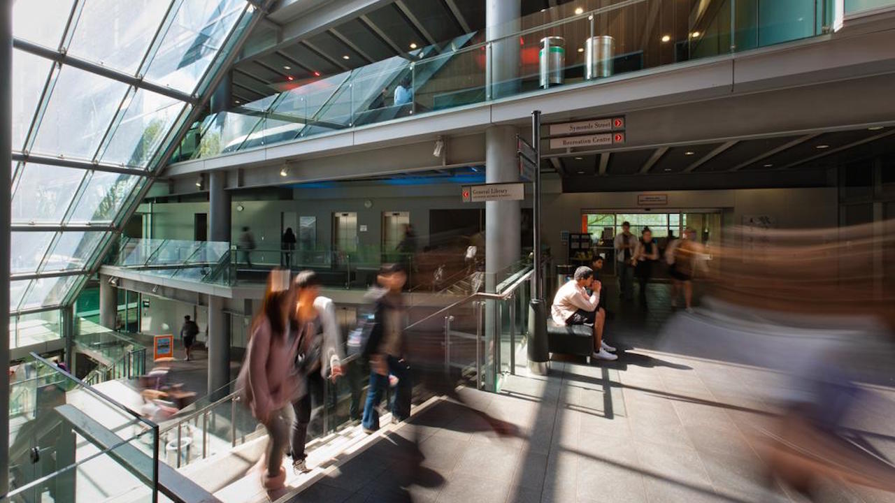 Students in the Kate Edger Centre at the University of Auckland, slow motion blur