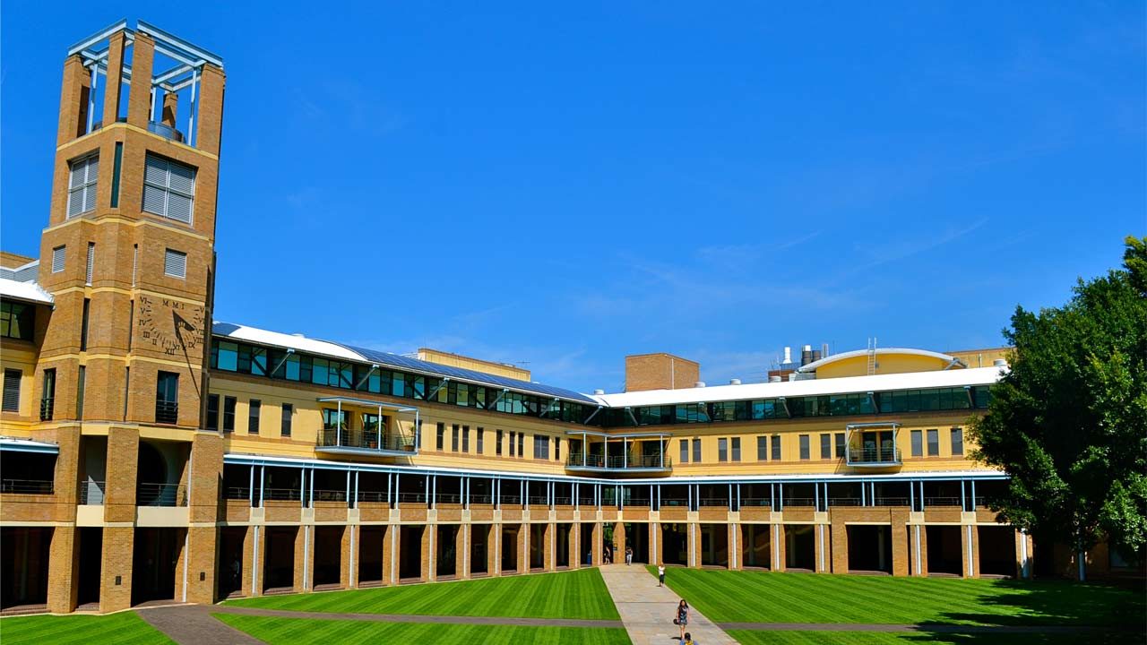 UNSW's main quad with freshly groomed grounds and a picturesque blue sky