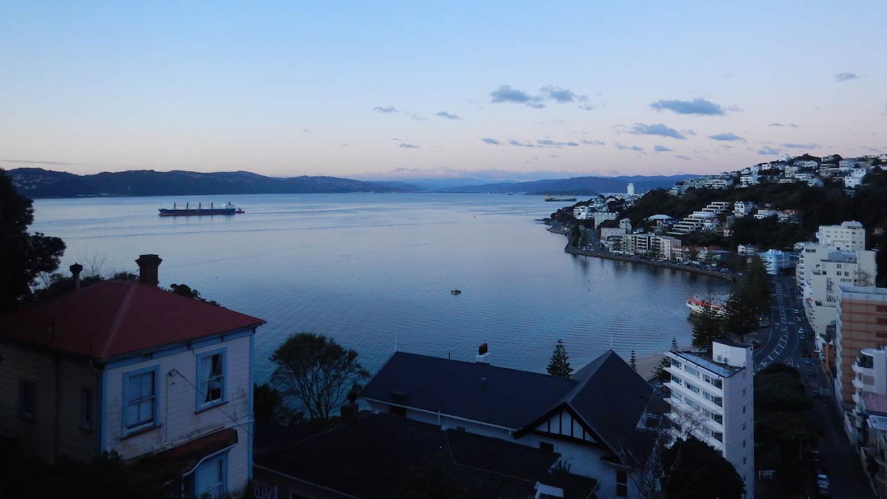 Wellington harbour and surrounding neighborhoods at dusk