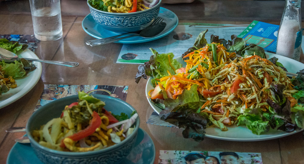 Shan salads and khao soy at Free Bird Cafe in Chiang Mai