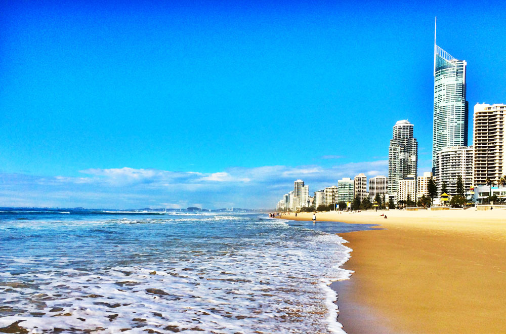 Running on the beach at sunrise at Broadbeach