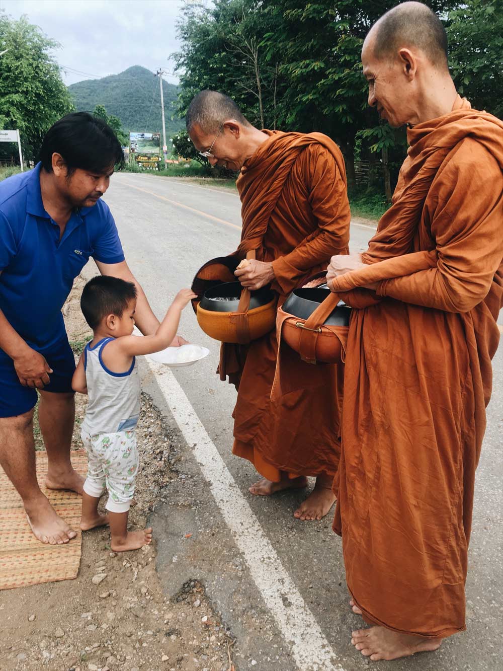 Buddhist monks alms round Thailand